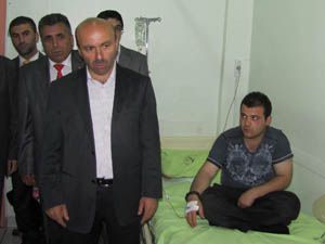 Tüfekçi yaralıları ziyaret etti