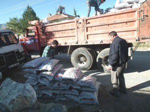 Şehit ve gazi ailelerine kömür ve nakdi yardım