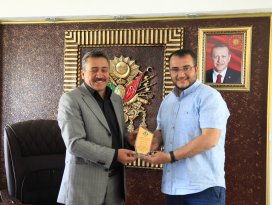 Başkan Tutal’a çevre duyarlılık plaketi