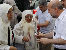 15 Temmuz şehitlerinin yakınları kutsal topraklarda
